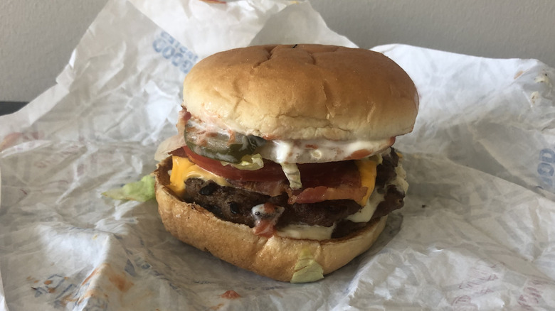 Bacon cheeseburger deluxe stackburger on wrapping paper