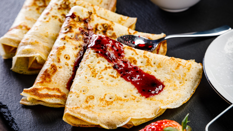 Crepes drizzled with jam