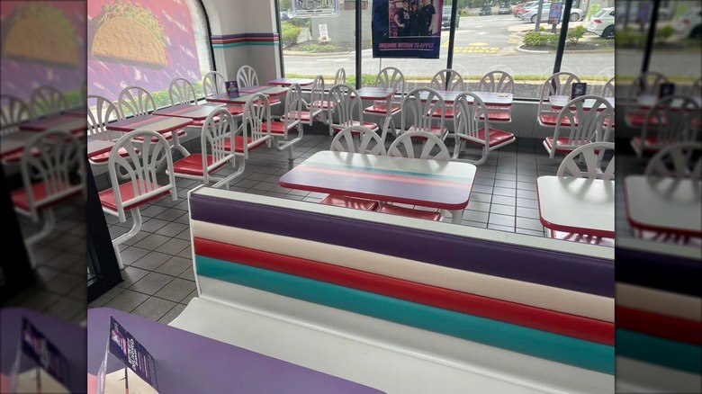 90s-style Taco Bell with colorful booths and white tables