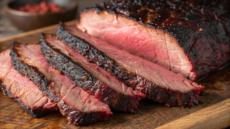 Close-up of sliced brisket on a cutting board