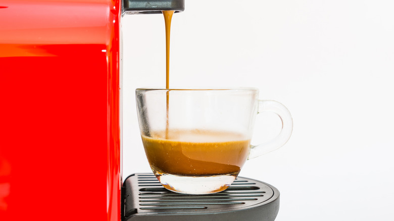 nespresso machine with coffee