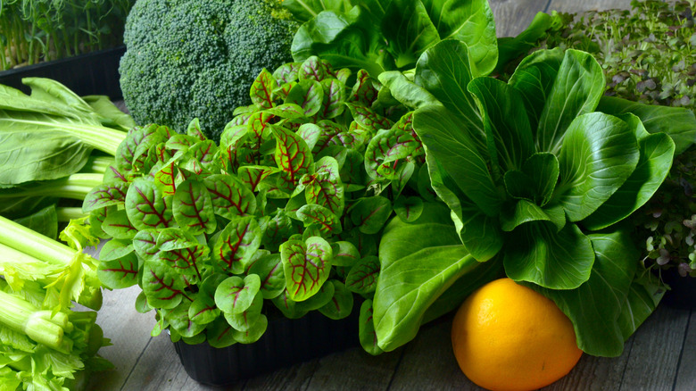 leafy green vegetables, broccoli, lemon