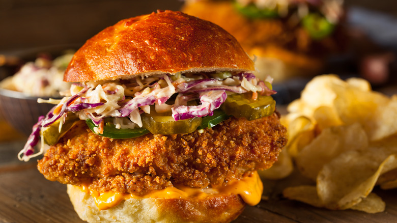 fried chicken sandwich with jalapenos and slaw