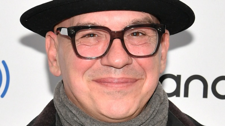 Michael Symon smiling at red carpet event