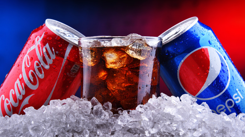 Pepsi and Coca-Cola cans