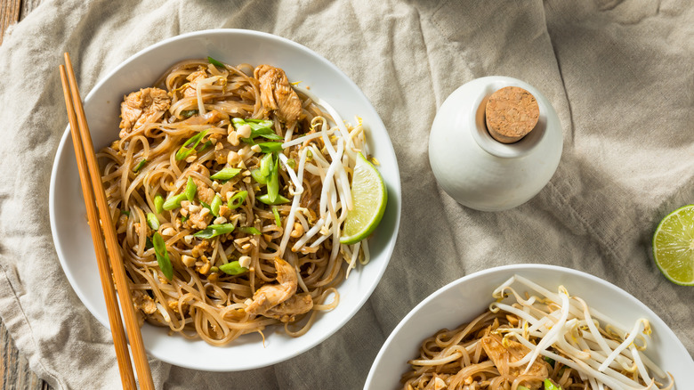 pad thai noodles on plates