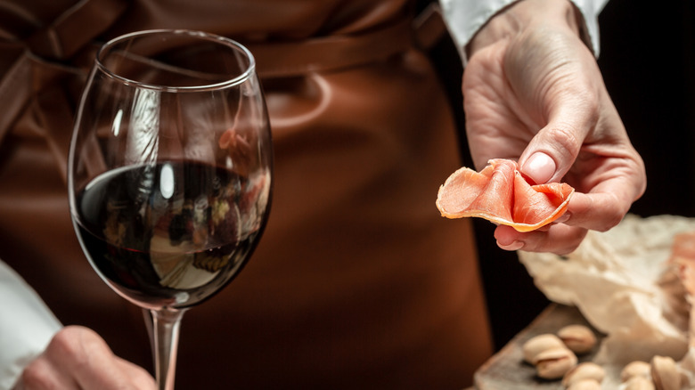 Wine glass and prosciutto