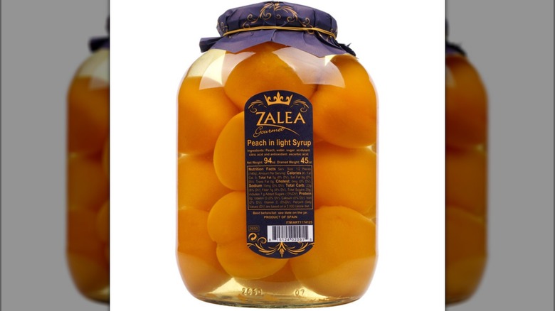 A jar of Zalea Gourmet Peach in Light Syrup