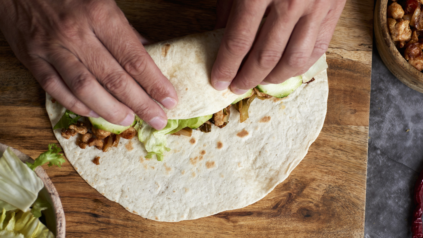 The Key Difference Between Burritos And Chimichangas