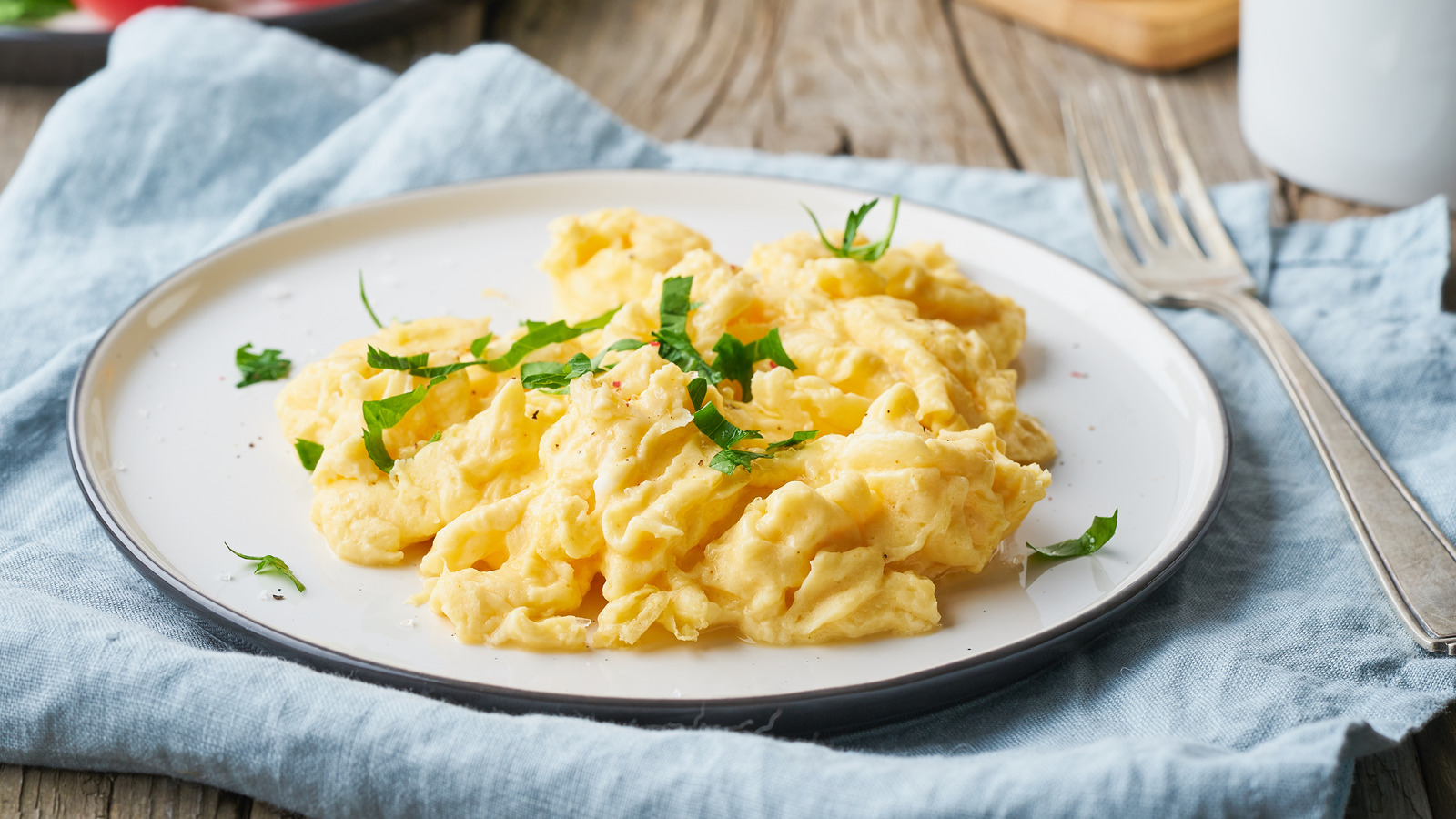 The Key Tip For Cooking Softer Scrambled Eggs