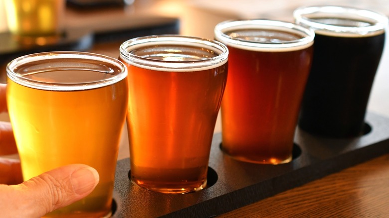 A colorful four beer flight