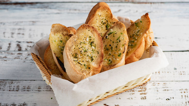 slices of garlic bread in basket
