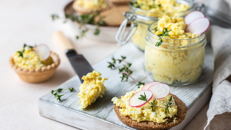 egg salad in jars and on knife