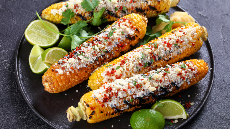 four elote on a plate