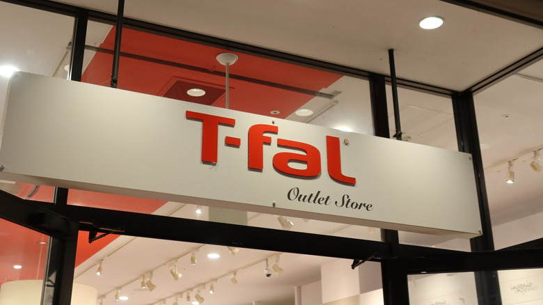 A T-fal store sign inside an indoor shopping center
