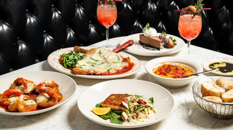 Selection of entrees, drinks, and a dessert and bread at Maggiano's Little Italy