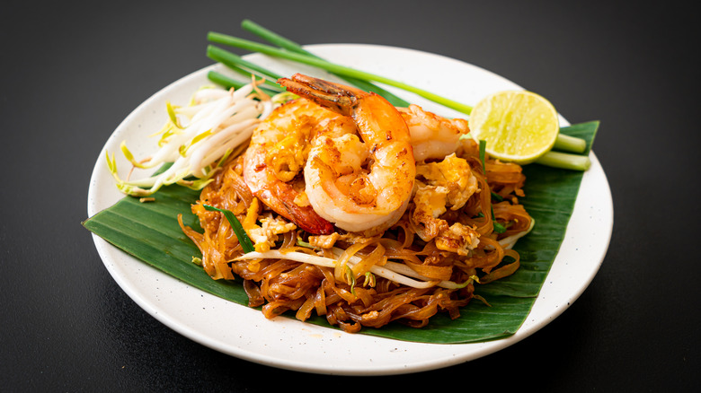 Pad Thai noodles on white plate
