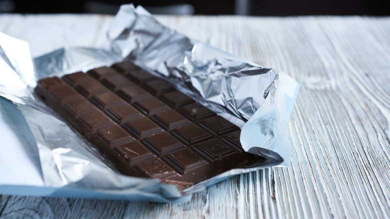 a bar of chocolate unwrapped on counter
