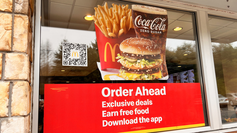 window decal advertising McDonald's app with QR code