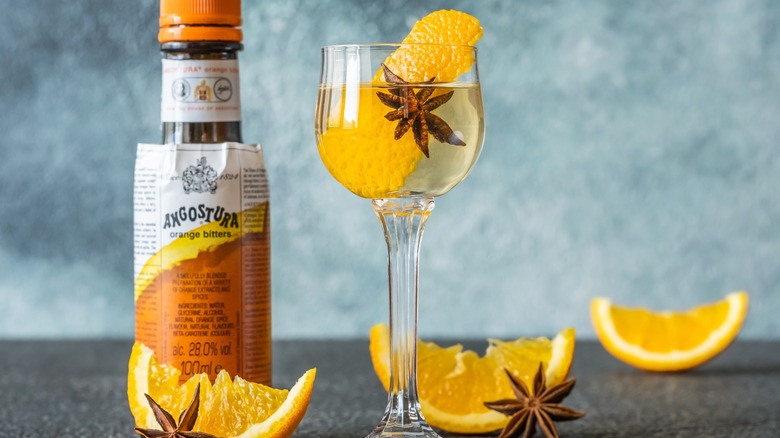 Angostura bitters with oranges and a drink