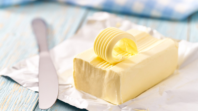 Stick of butter with knife
