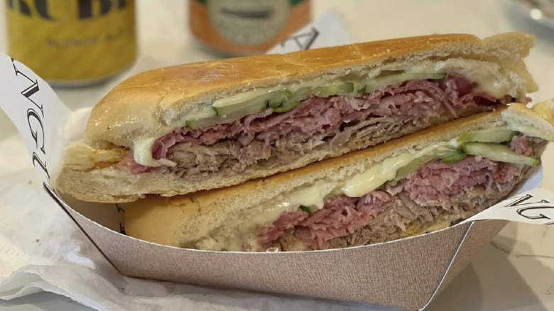 open and sliced Cuban sandwich