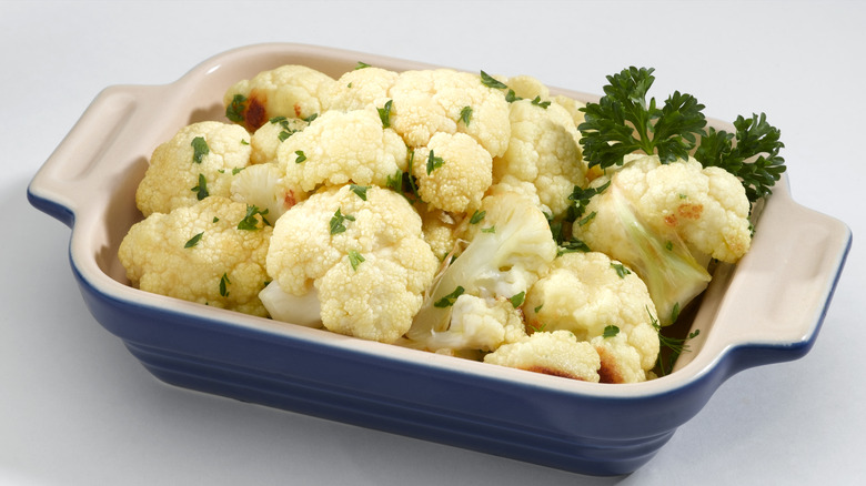 Cauliflower pieces topped with herbs