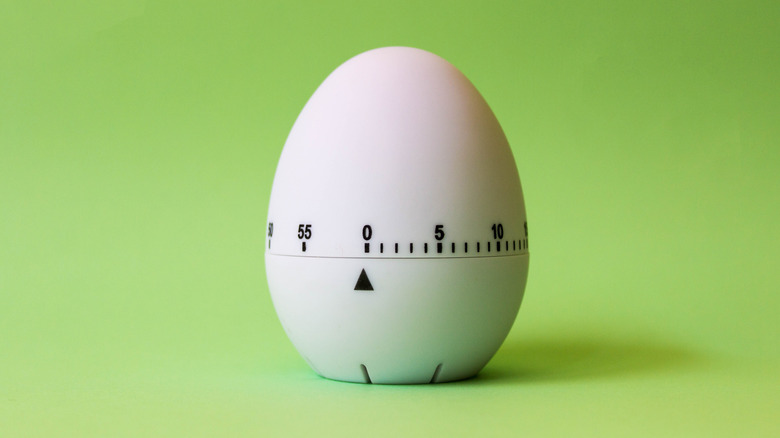 egg timer, green background