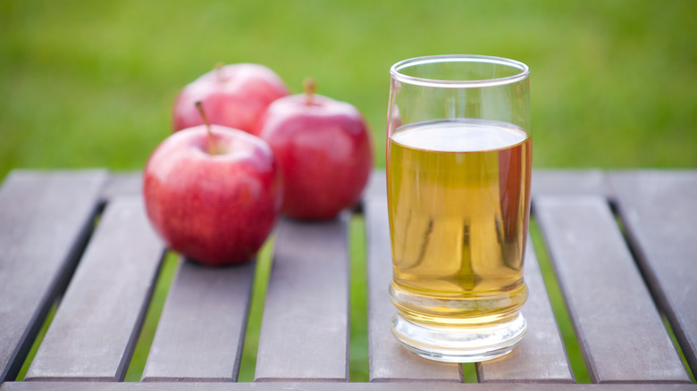 apples and glass of cider