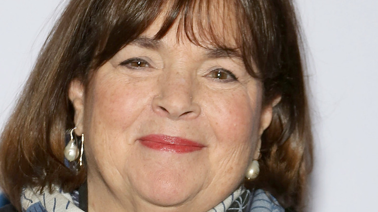 Ina Garten smiling with scarf, pearls