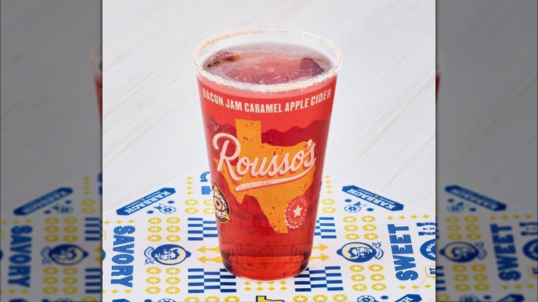 Glass of Bacon Jam Caramel Apple Hard Cider from Rousso's Concessions