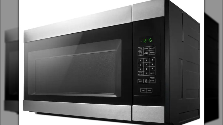 Amana microwave on white background at angle