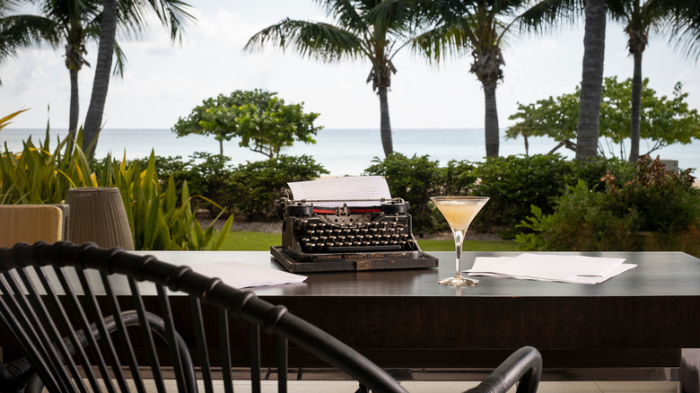 Beachfront vintage typewriter and cocktail