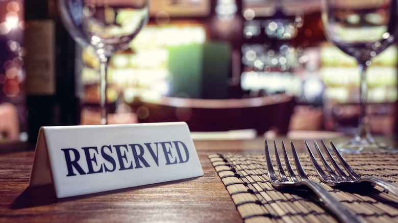 reserved sign placed on table