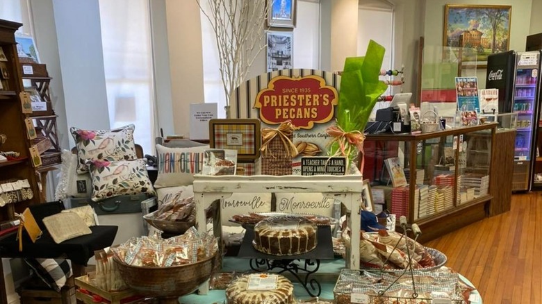 Inside Preston's Pecans store with various candies on display