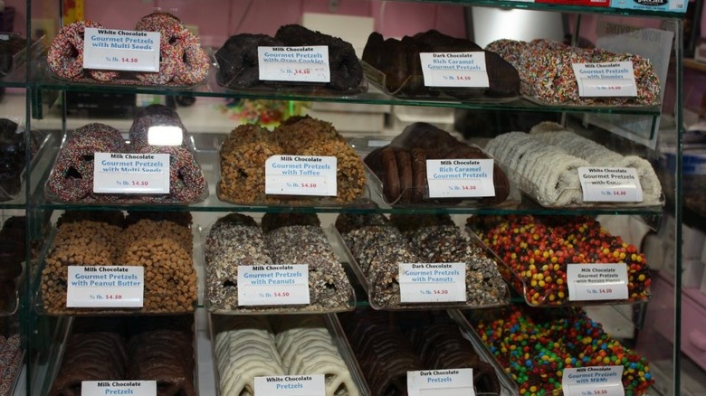 Coated pretzels in a candy store display