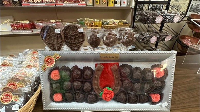 Various chocolates on a shelf in a candy store