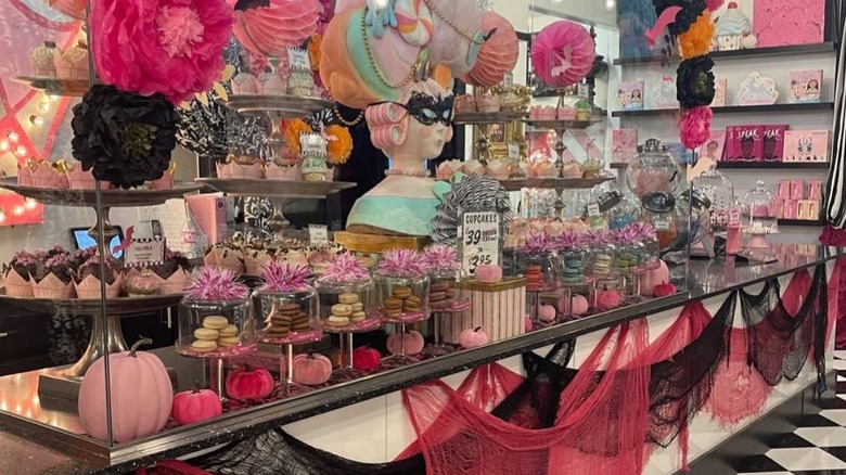 A countertop with colorful candy and decorations