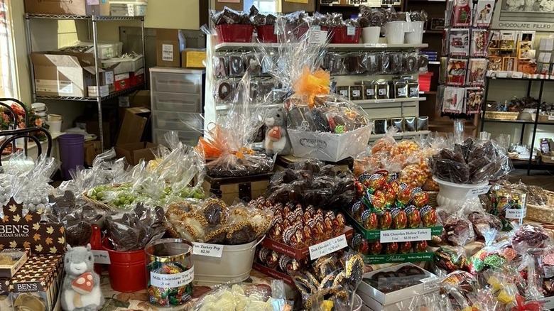 A table with a variety of candy including Easter eggs