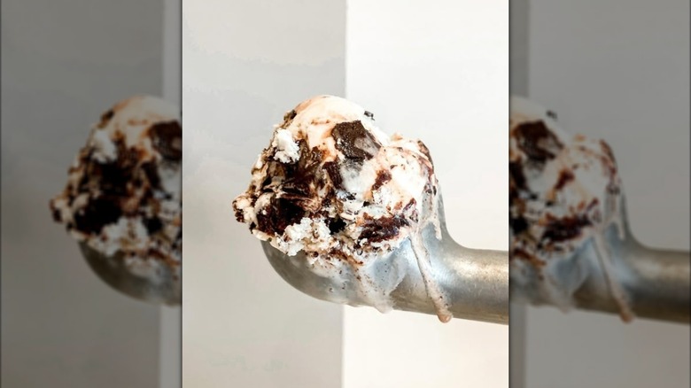 Moose Tracks ice cream in metal scoop