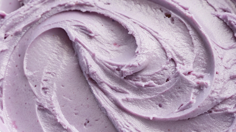 Close-up of purple ice cream with berry flecks