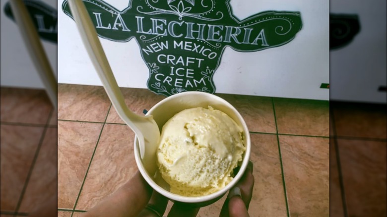 Tub of New Mexico green chile ice cream with spoon