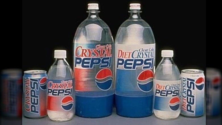 Vintage ad for Crystal Pepsi that shows the drink in cans and bottles of various sizes.