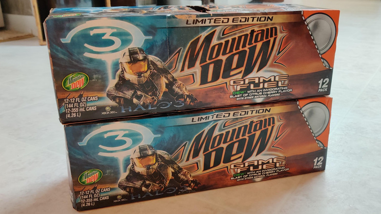 Two vintage 12 packs of Halo 3 Mountain Dew Game Fuel soda.
