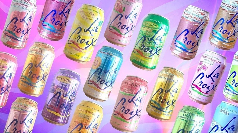 Various flavors of La Croix soda cans on a pastel background.