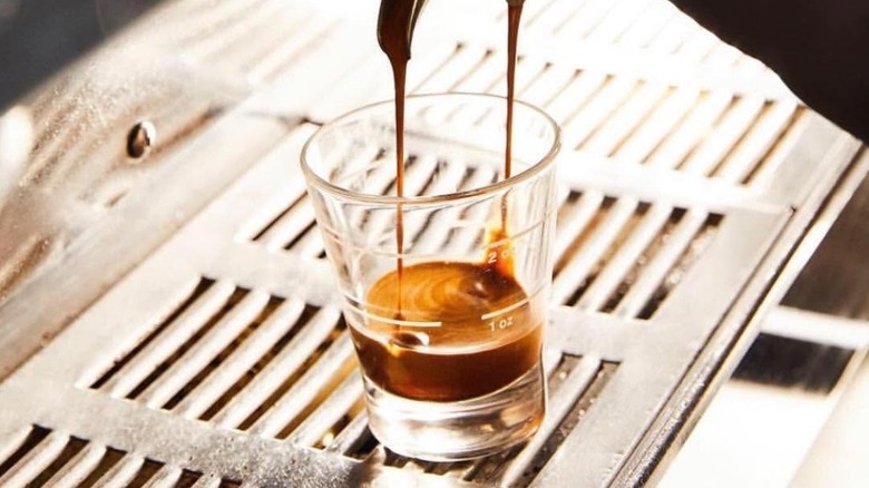 A Peets Coffee barista making espresso