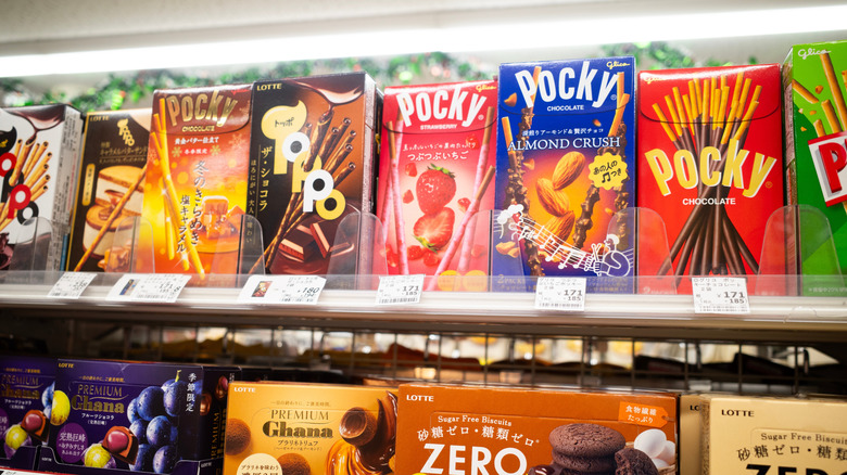 Various chocolate snacks including pocky on sale at convenience store