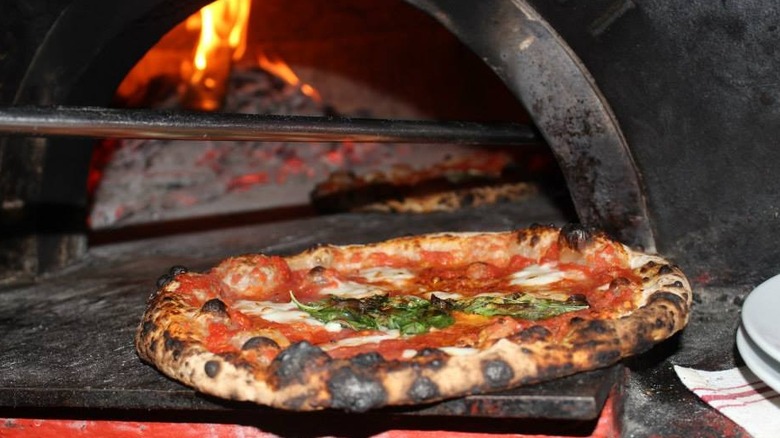 margherita pizza by pizza oven at Bestia in Los Angeles