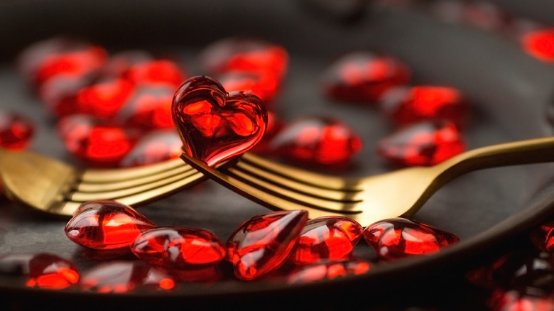 Hearts on a plate with gold fork