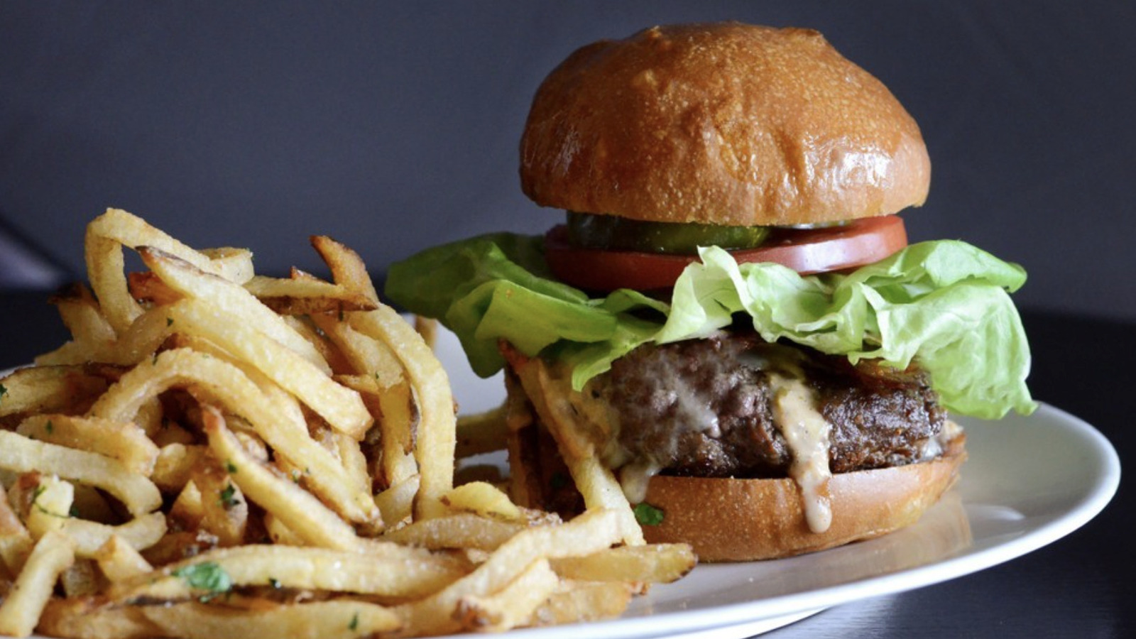 The Mouthwatering Burger At Steak 954 That's Making Diners Rethink The Ribeye - Tasting Table